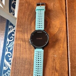 Garmin Black and Teal Forerunner 235